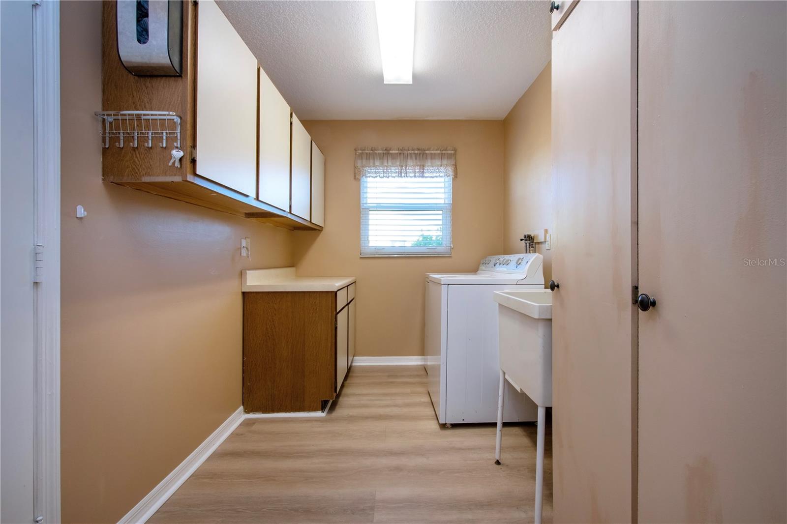INTERIOR LAUNDRY ROOM STEPS FROM KITCHEN