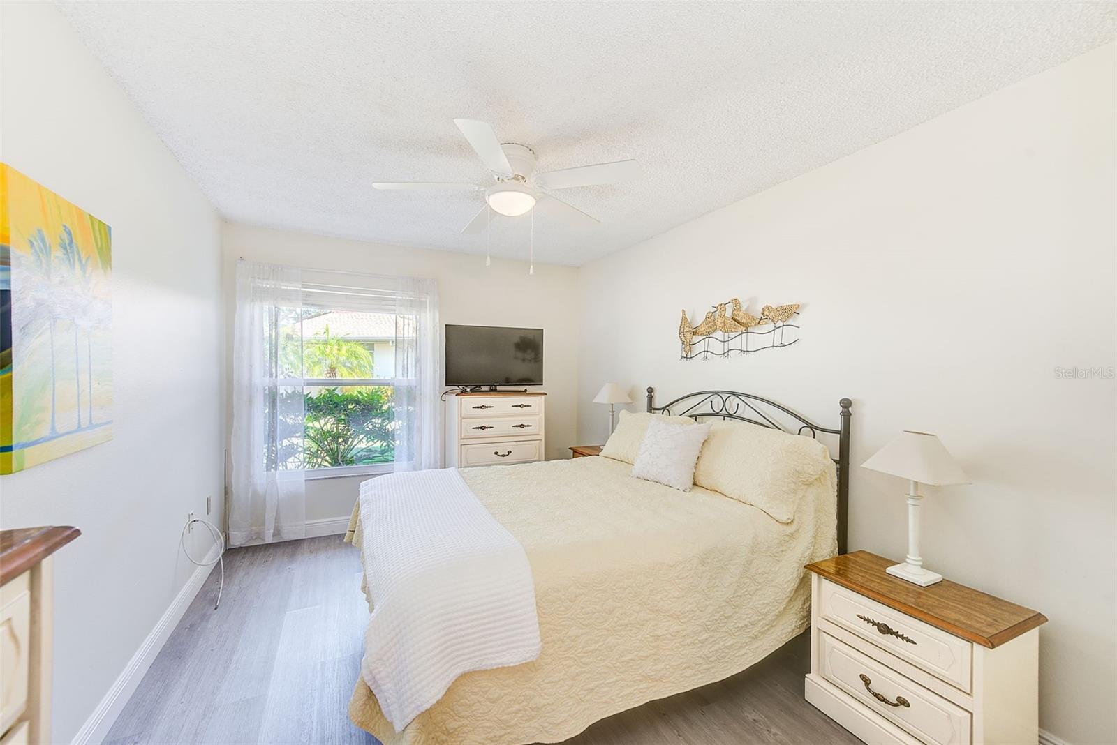 Primary Bedroom with Vinyl Plank flooring