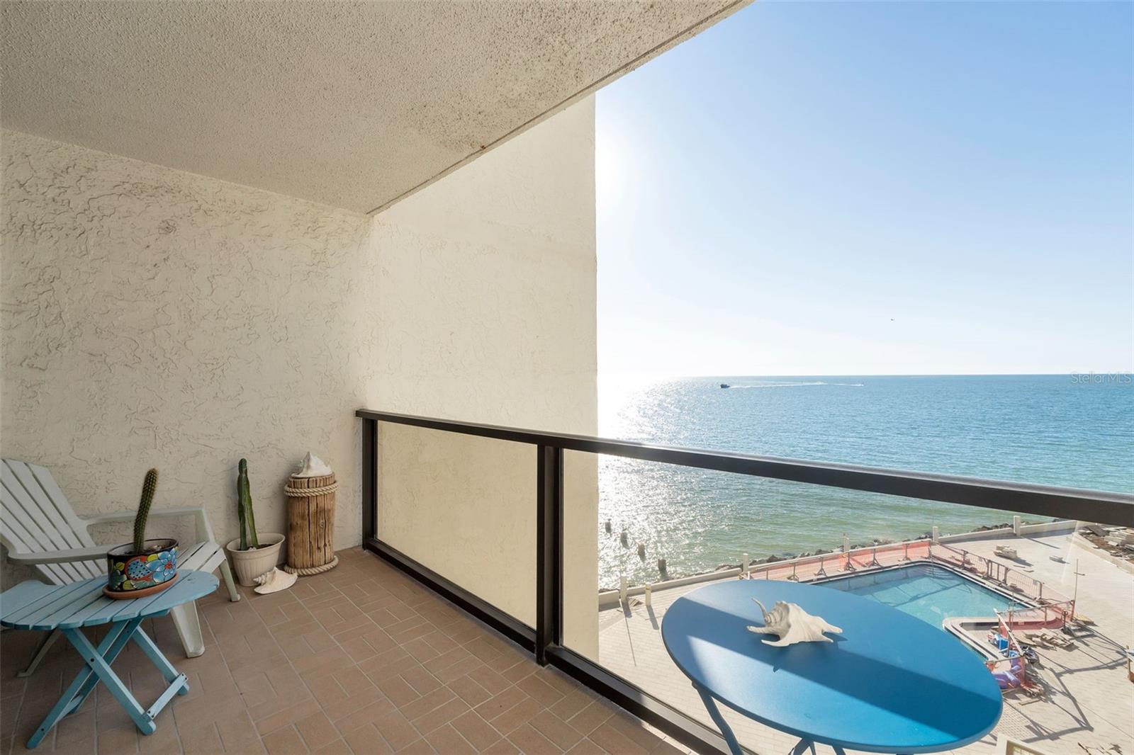 balcony with pool and gulf view