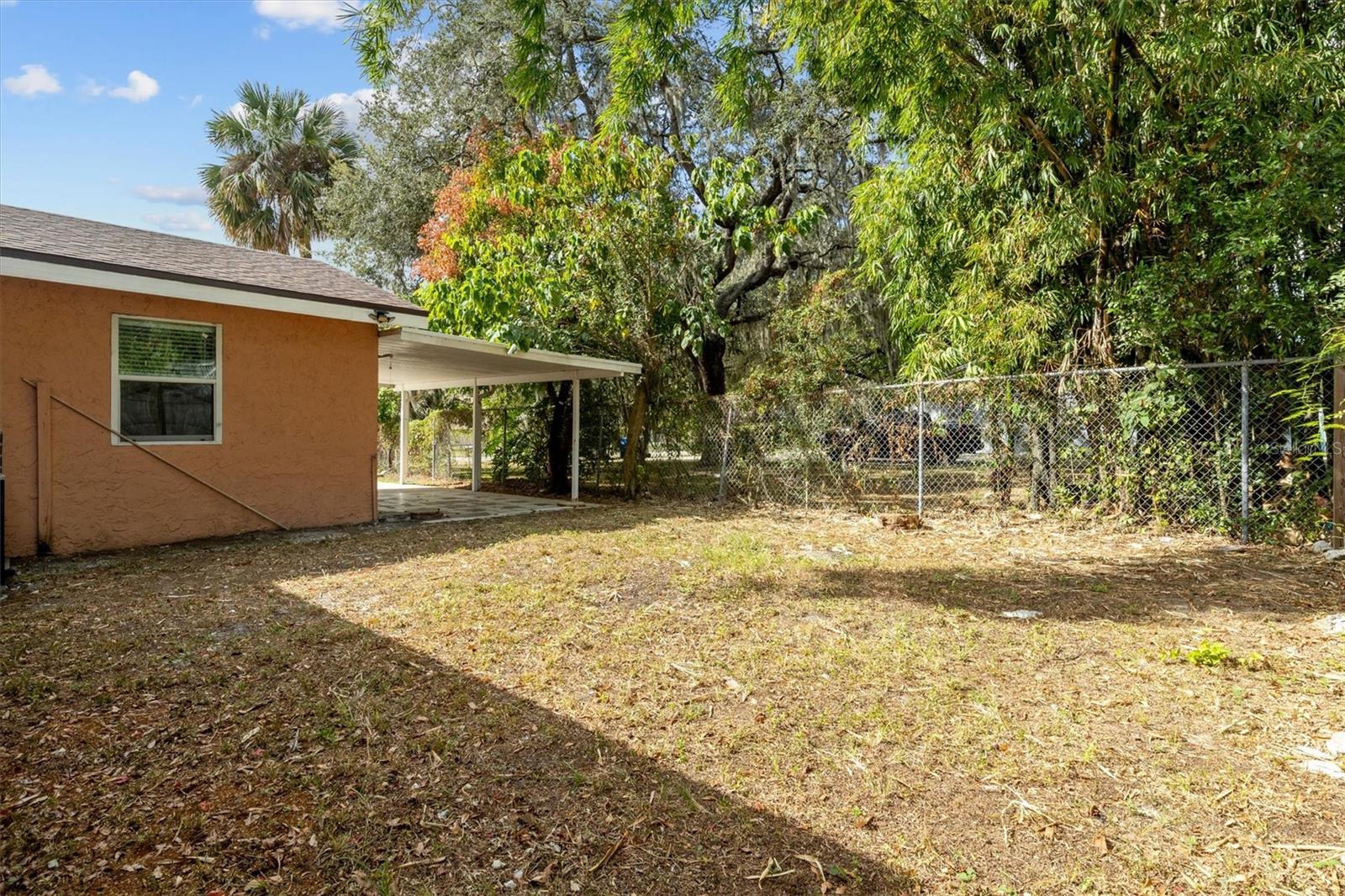 Backyard with Side Carport