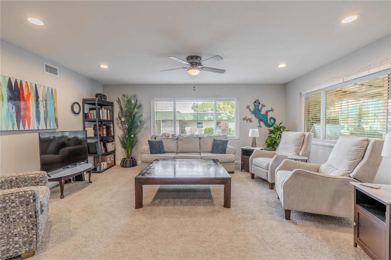 A wide, welcoming view of the living area that shows its full potential for entertaining or relaxing. This space feels effortless, comfortable, and filled with possibilities.