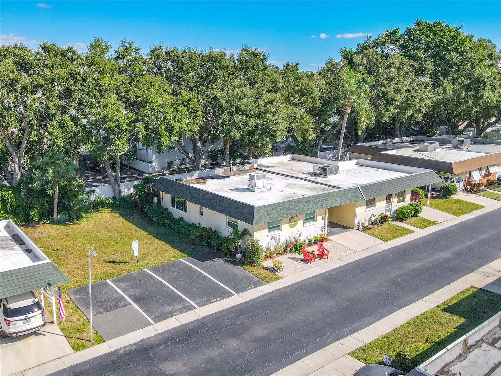 Ample guest parking conveniently located near the unit, offering easy access for visitors and friends. The well-maintained spaces reflect the community’s thoughtful design and welcoming atmosphere.