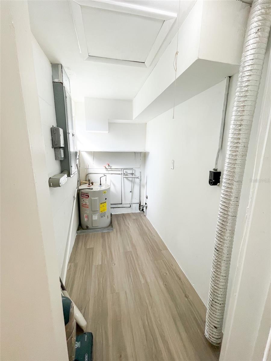 Inside laundry room.