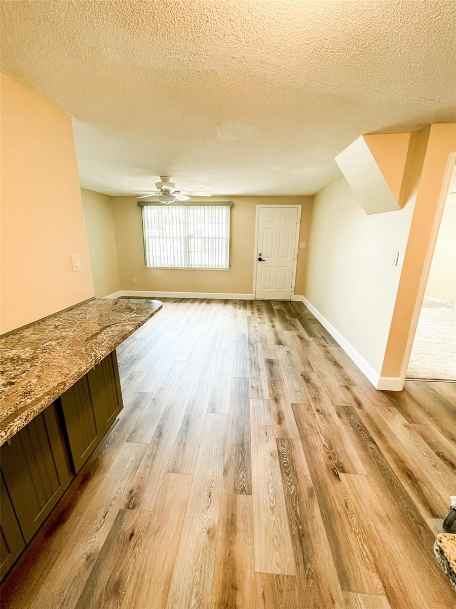 The bar off the kitchen adn family room provides seating and additional storage.