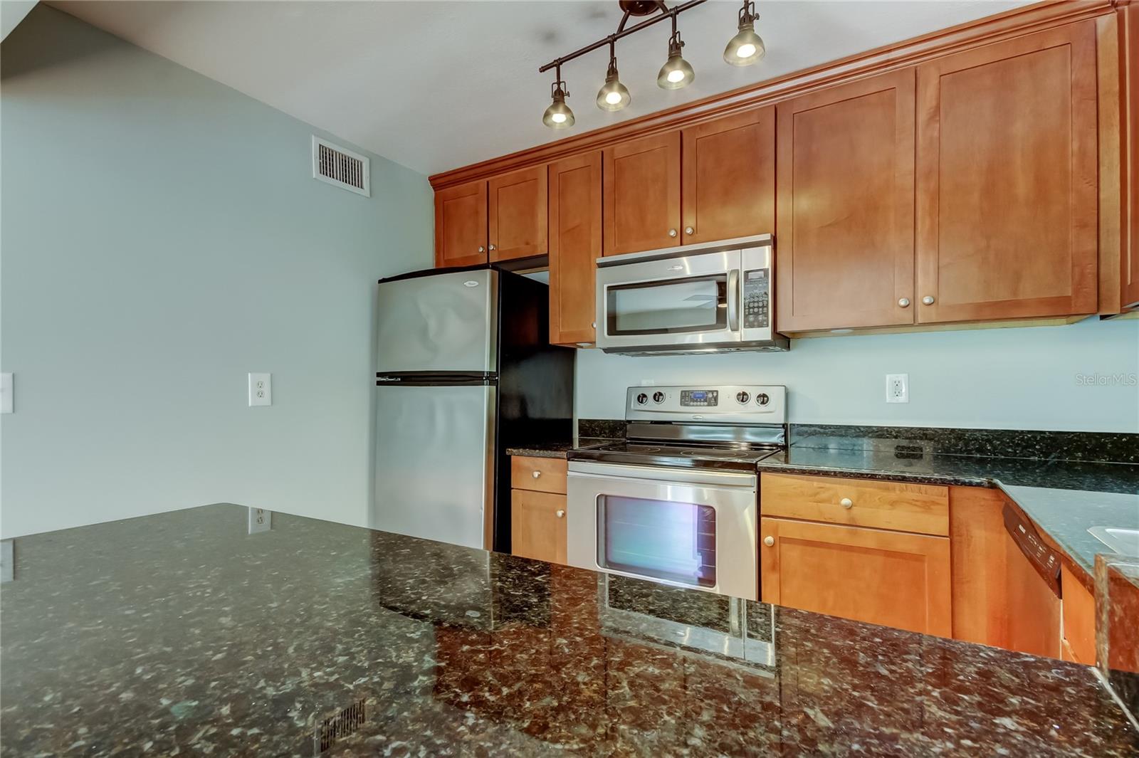 Granite and Solid Wood Cabinets