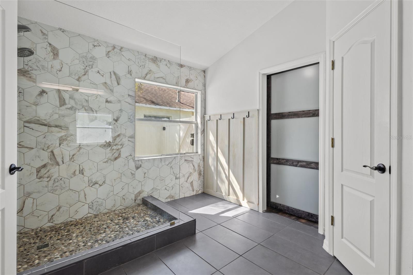 Primary bath with updated shower