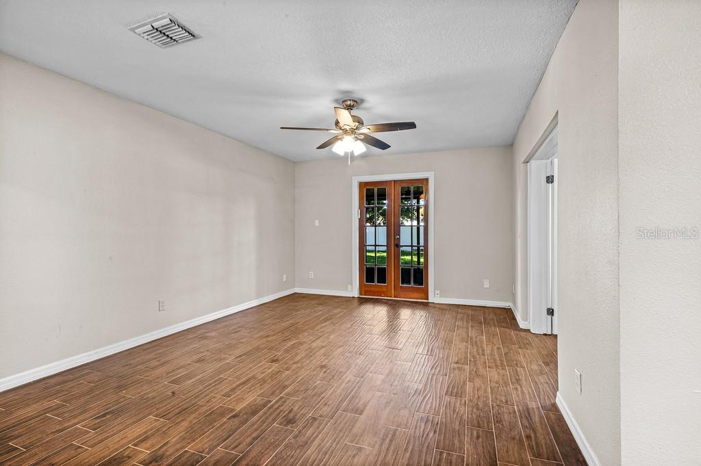 Family room with French doors to the screened porch