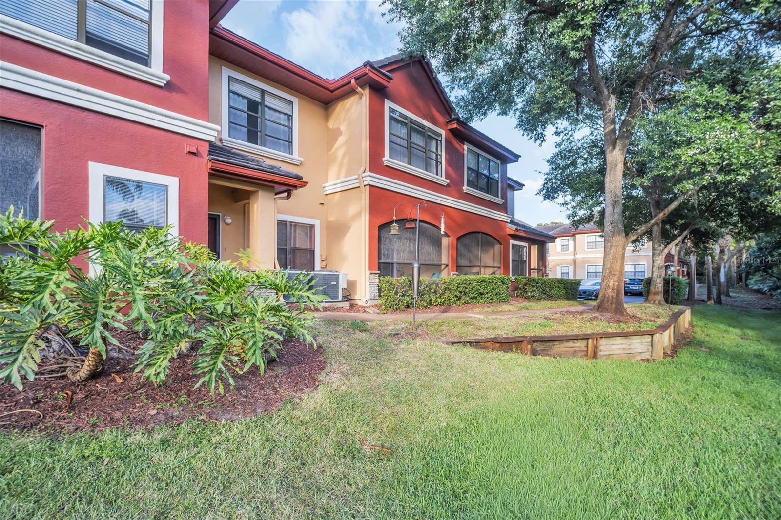 GRASSY AREA BEHIND CONDO