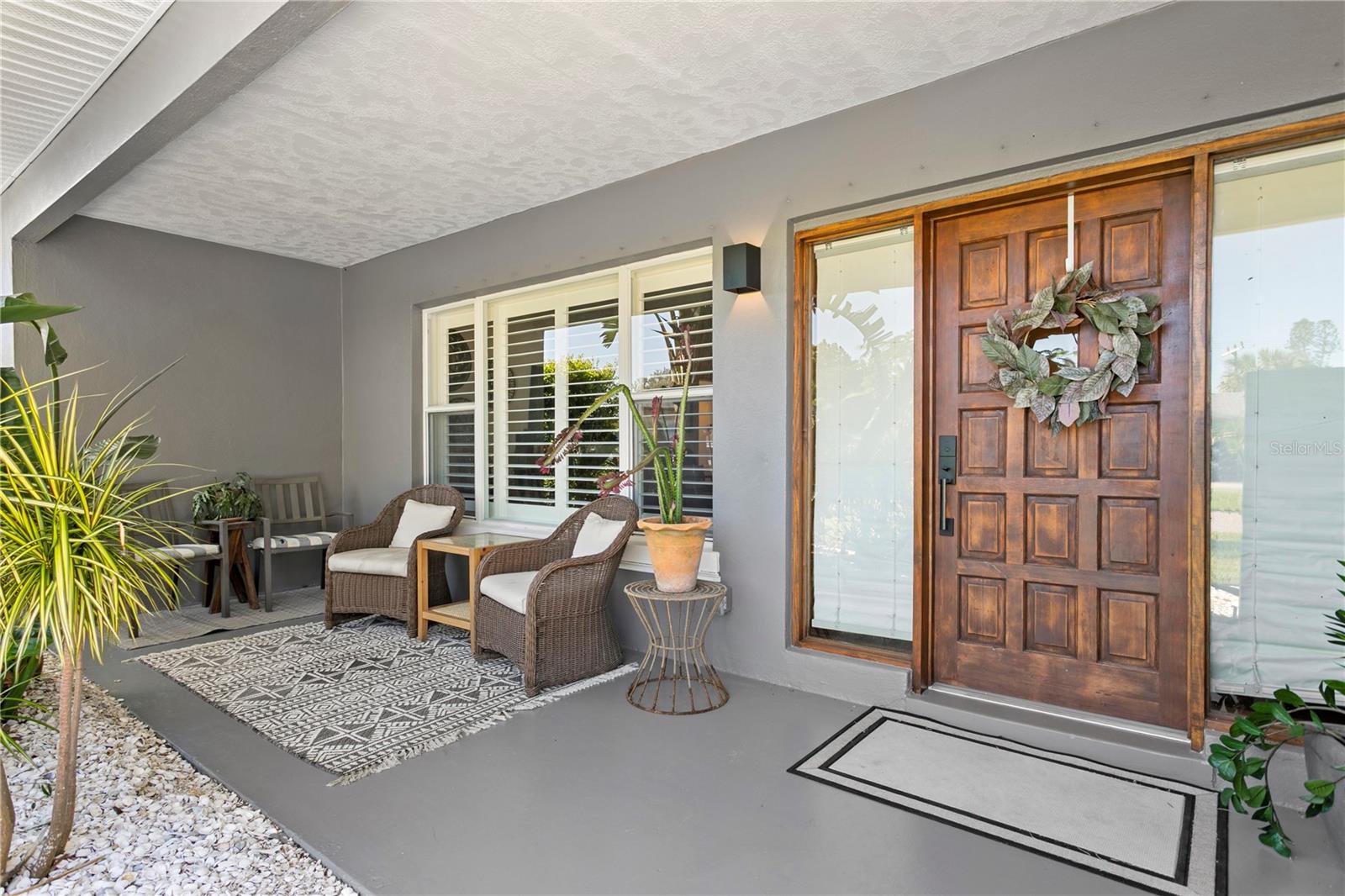 Impeccable curb appeal, curated landscaping, and an inviting front porch set the tone for the warmth and style that await inside...