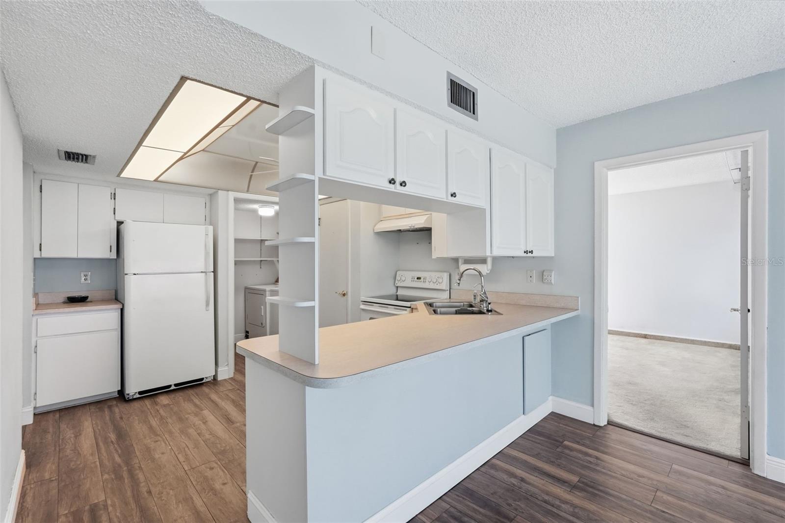 Kitchen/Laundry - Ready for your personal touch