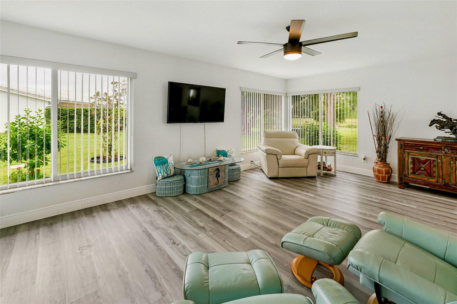 15-family room with greenspace view of pond