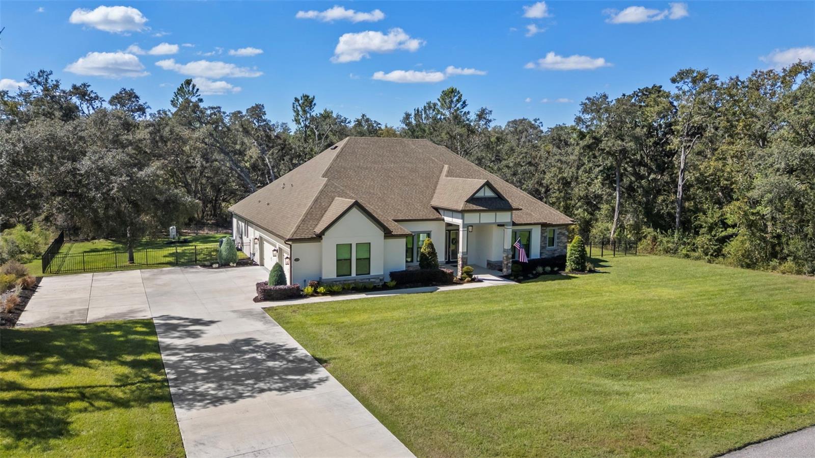 3 car garage with added parking pad