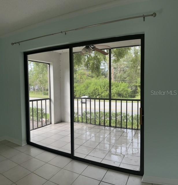 SCREENED BALCONY WITH STORAGE CLOSET
