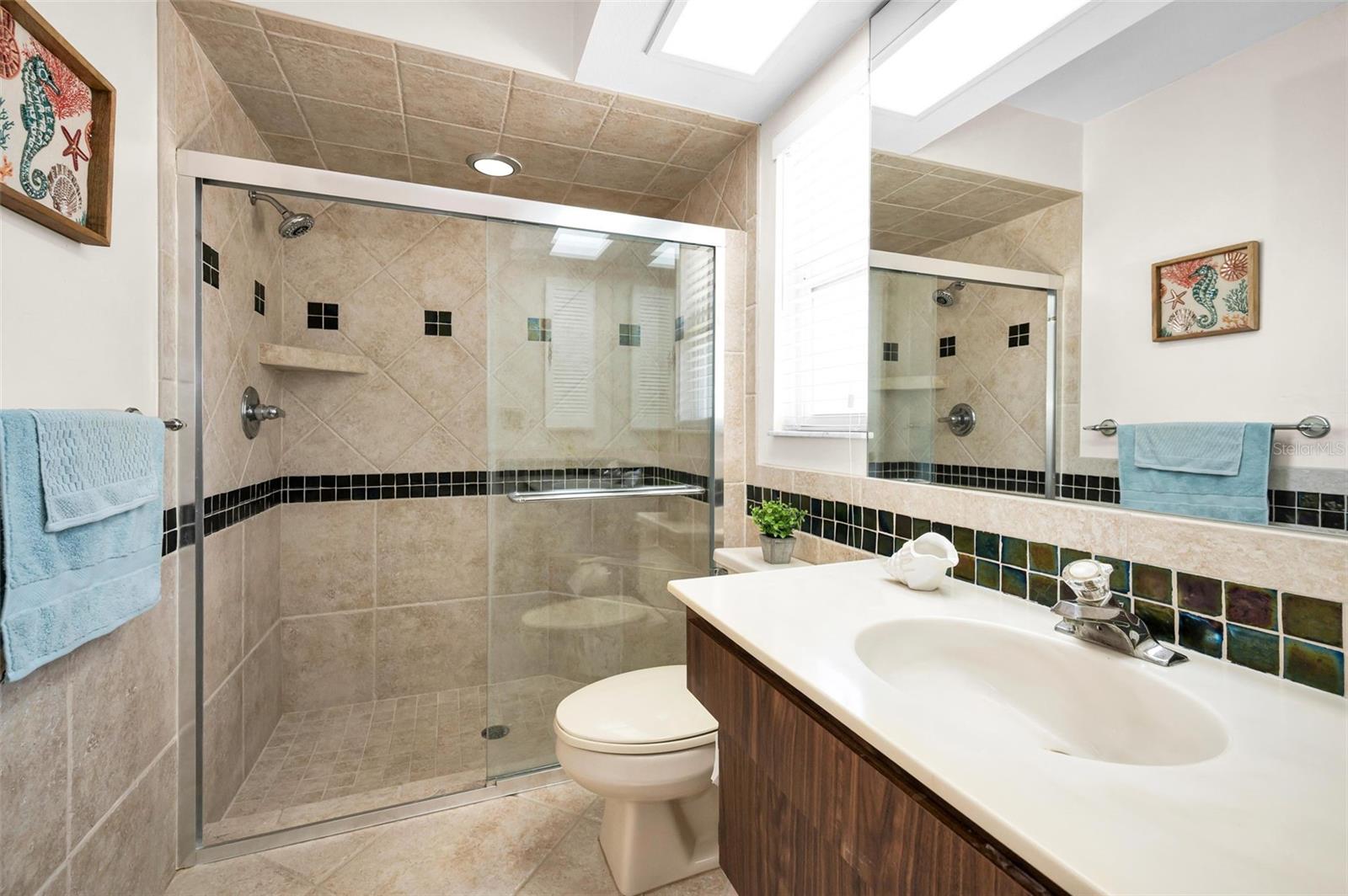 Primary bath with updated shower