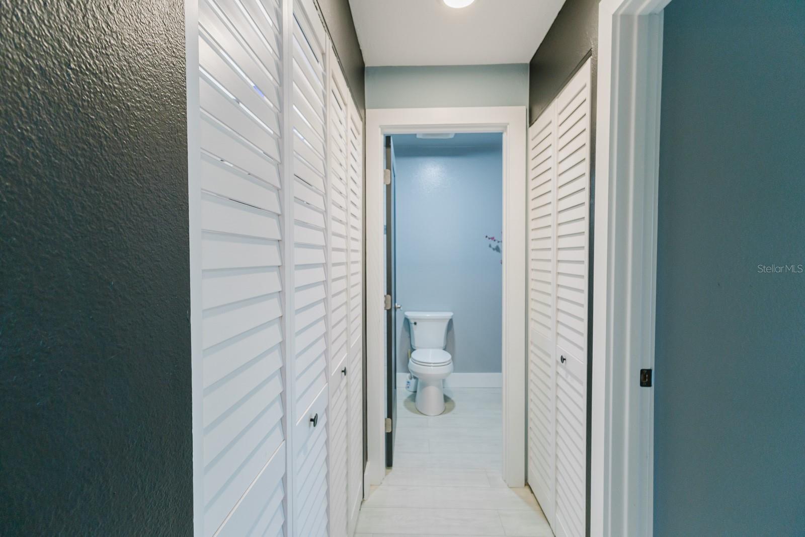 Hallway between guest room and guest bathroom.