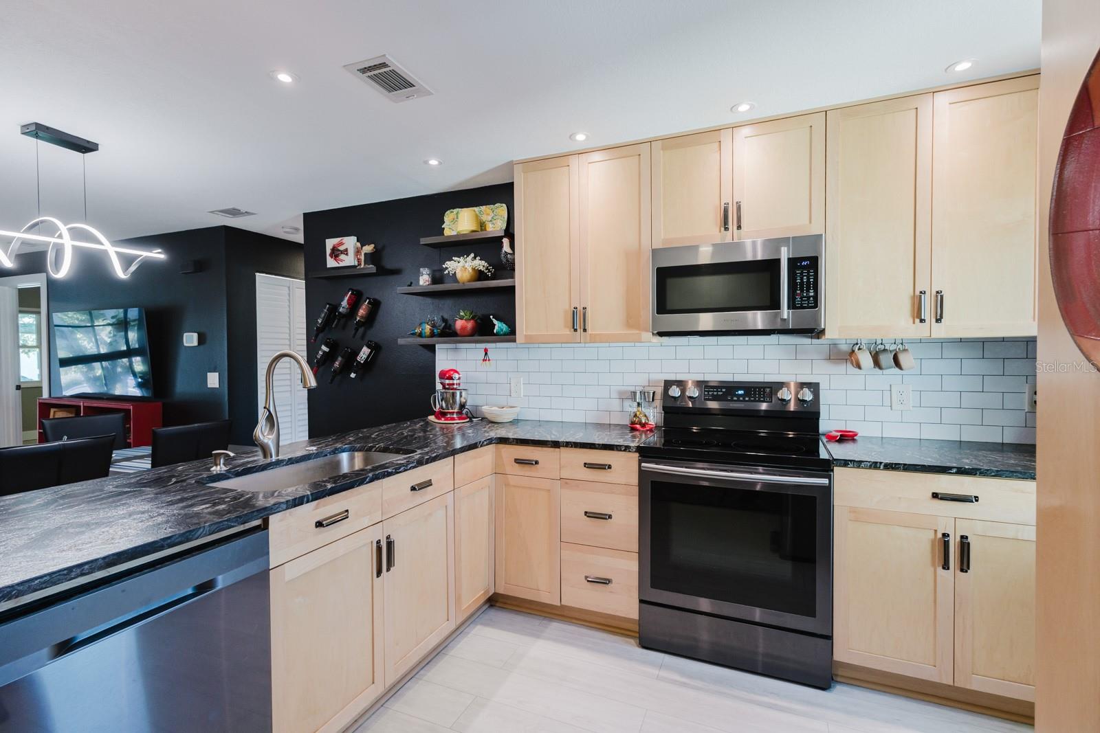 Kitchen black stainless appliances