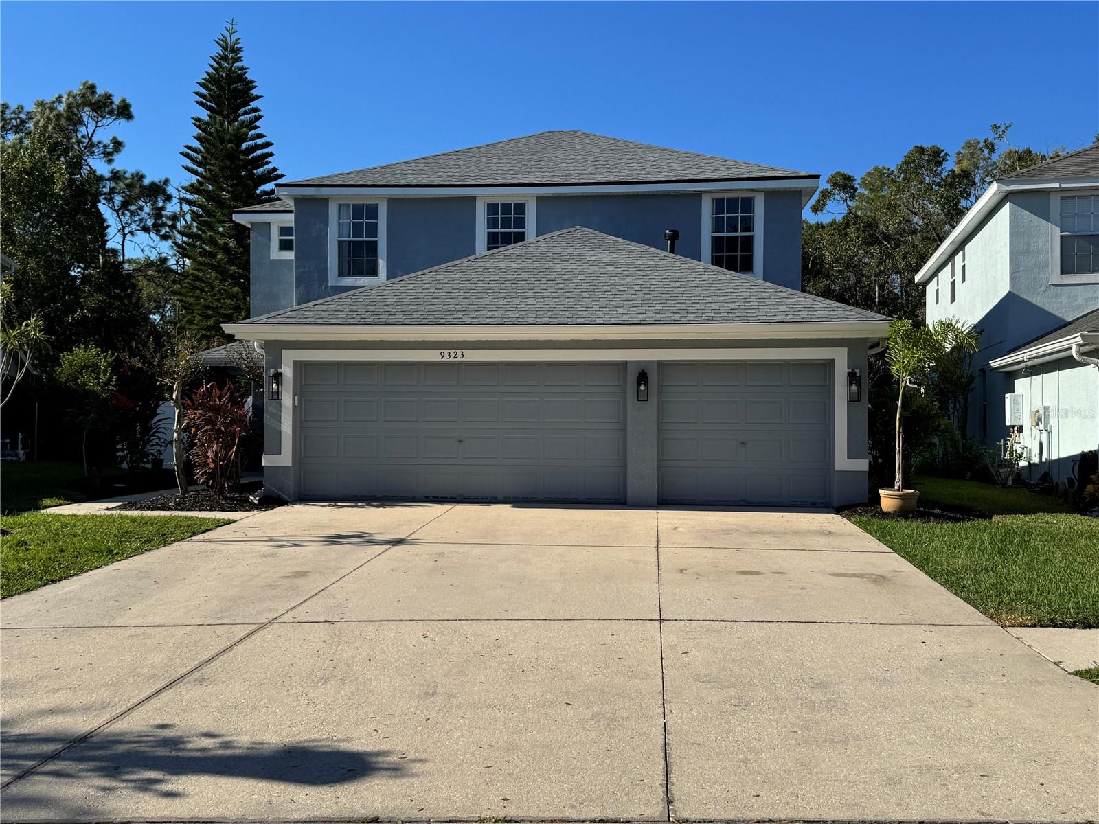 Home has a 3-car garage and wide driveway to accommodate lots of parking