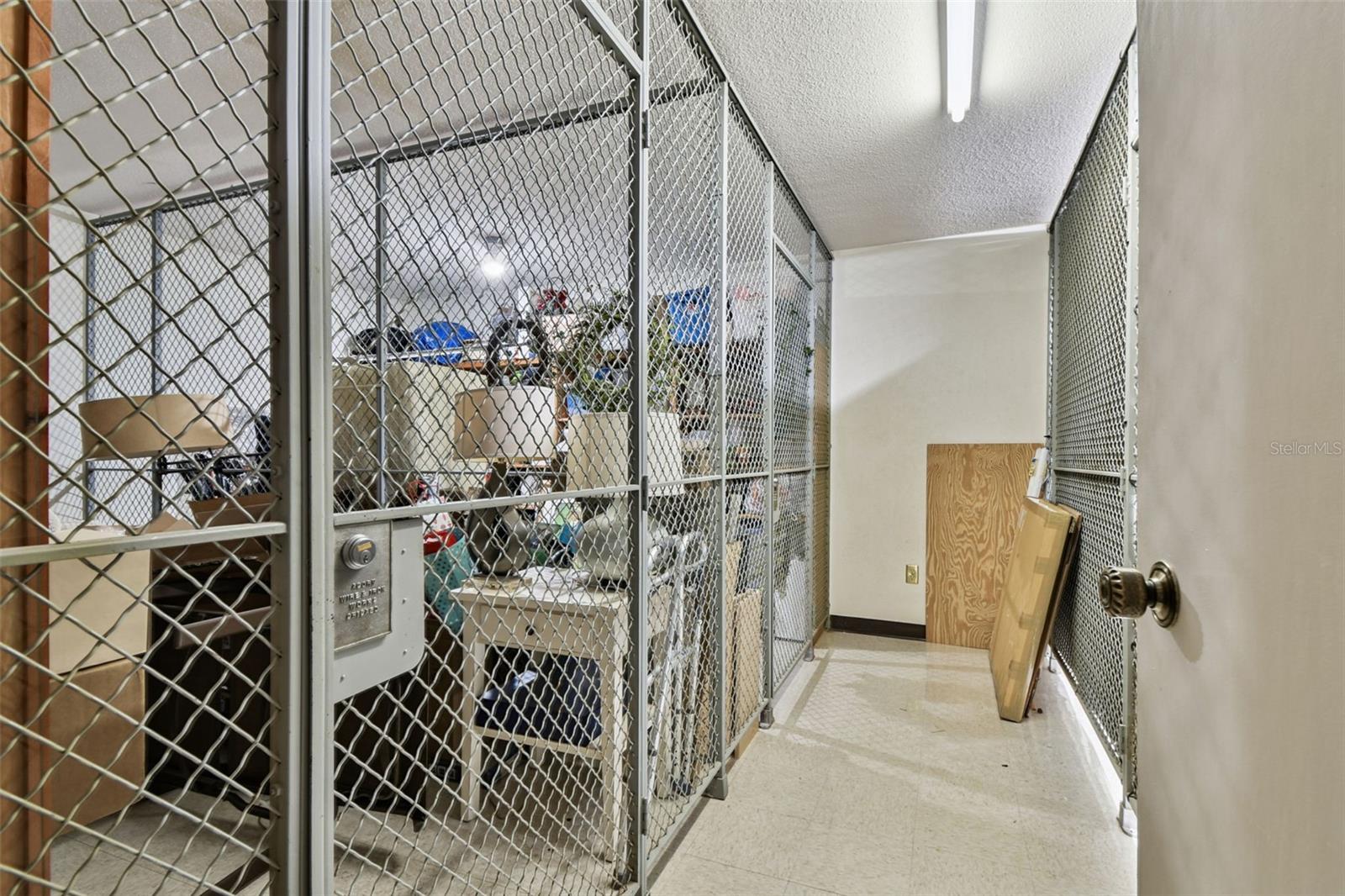 Air-conditioned storage cage near elevator