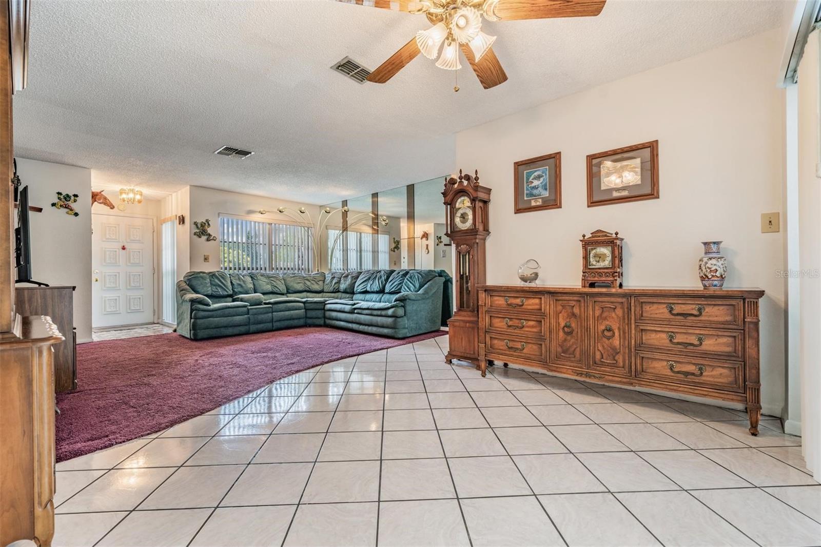 Extended living room or eating area, poss office.
