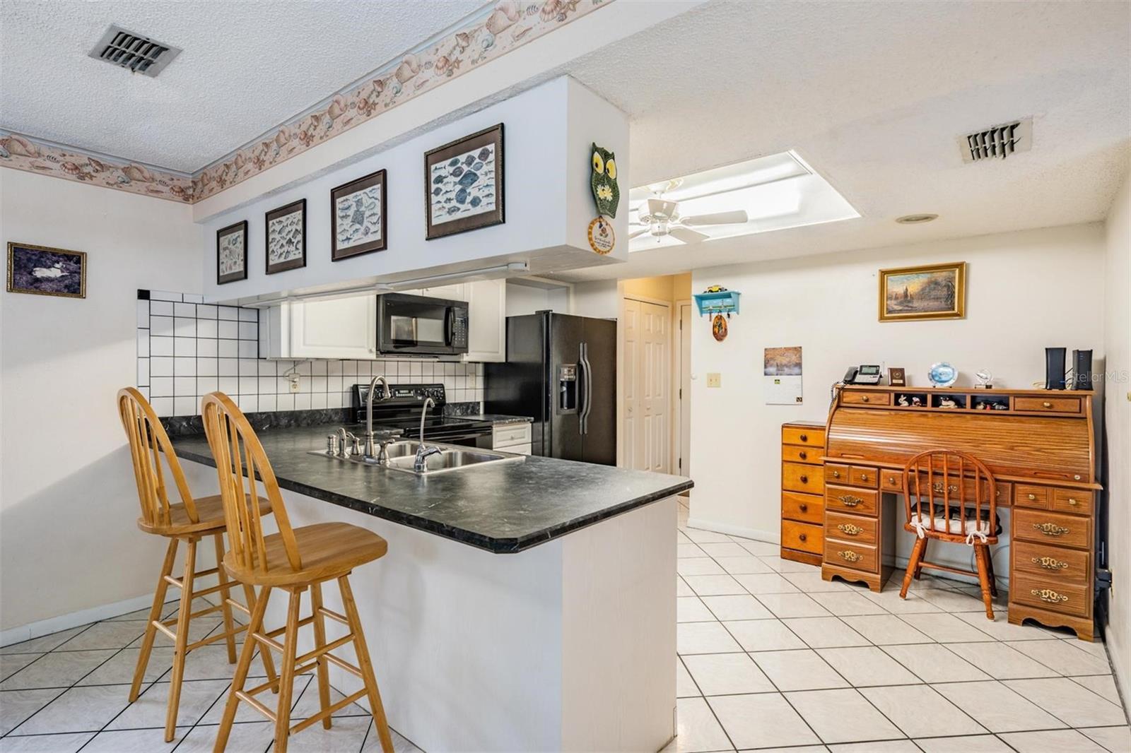 Open kitchen with eating bar or eat in kitchen