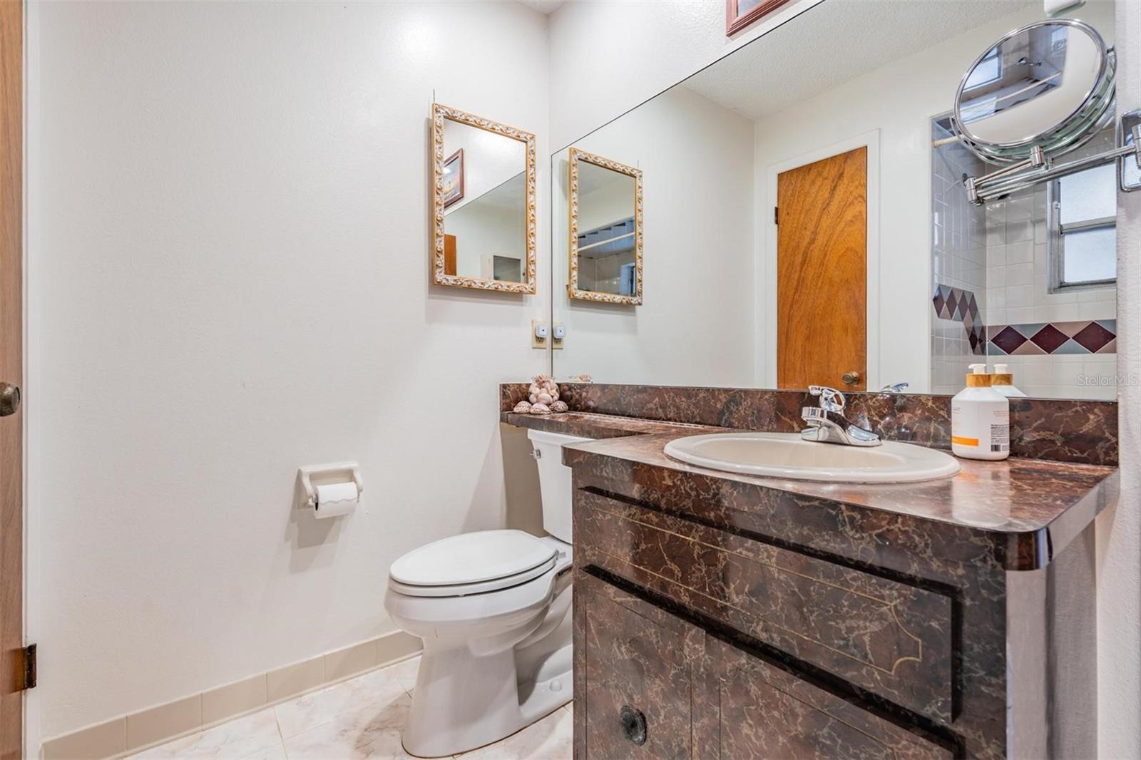 Bathroom next to primary room