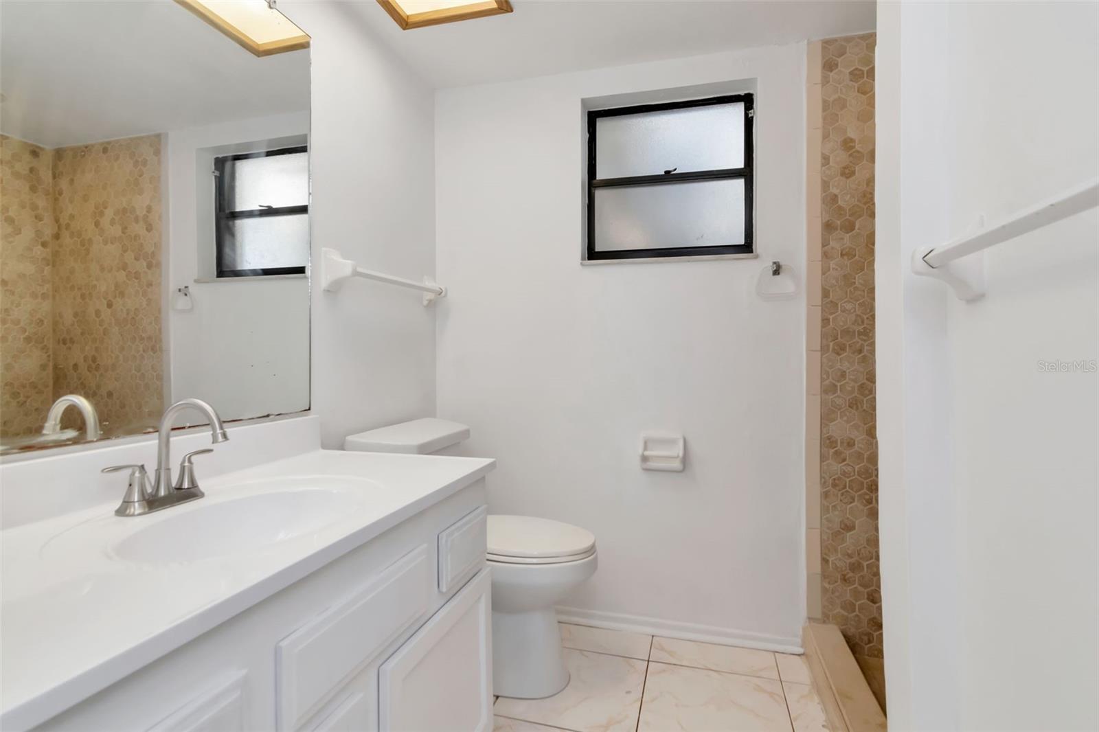 New quartz countertops in second bathroom