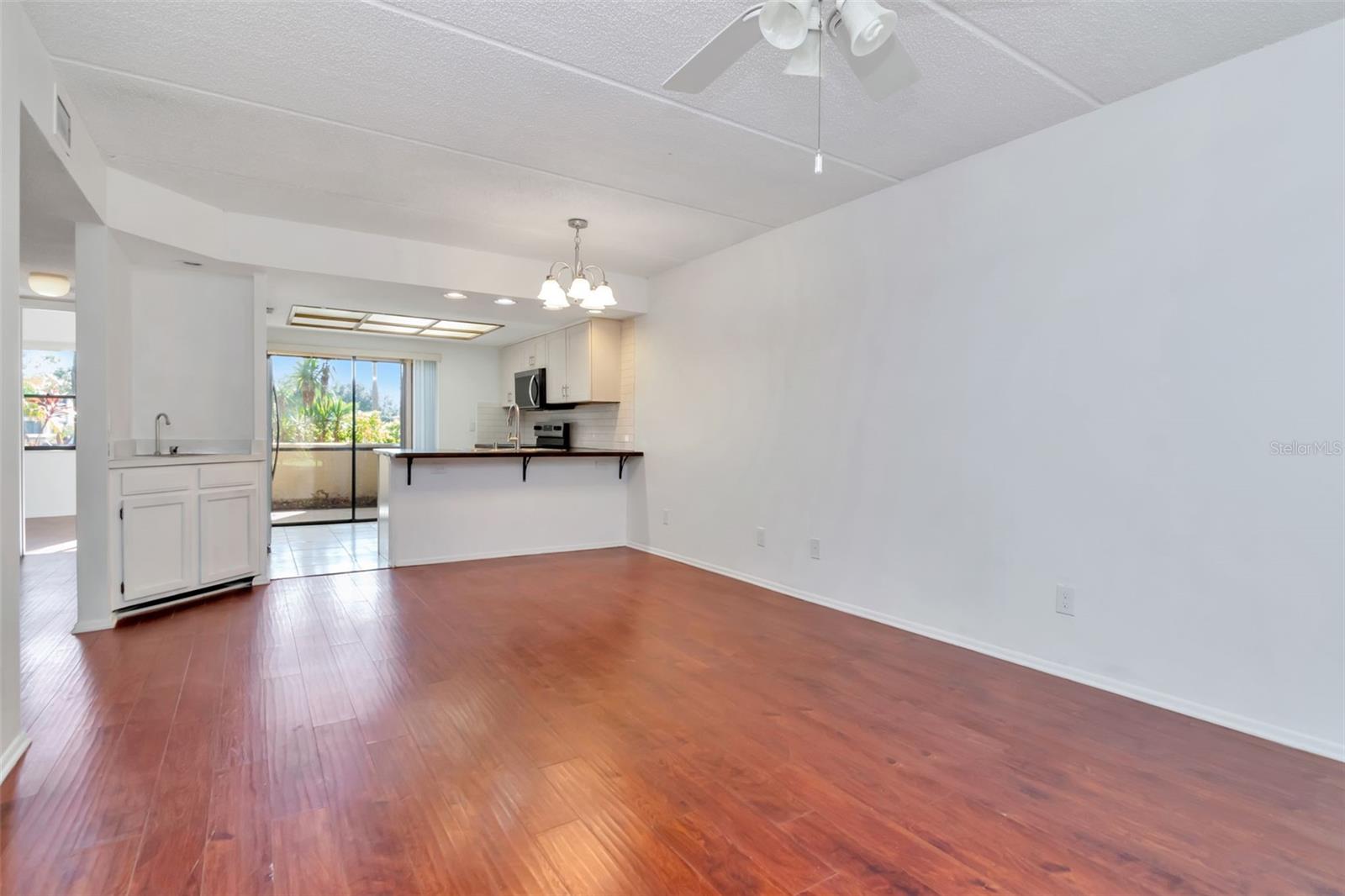 Great room with laminate flooring