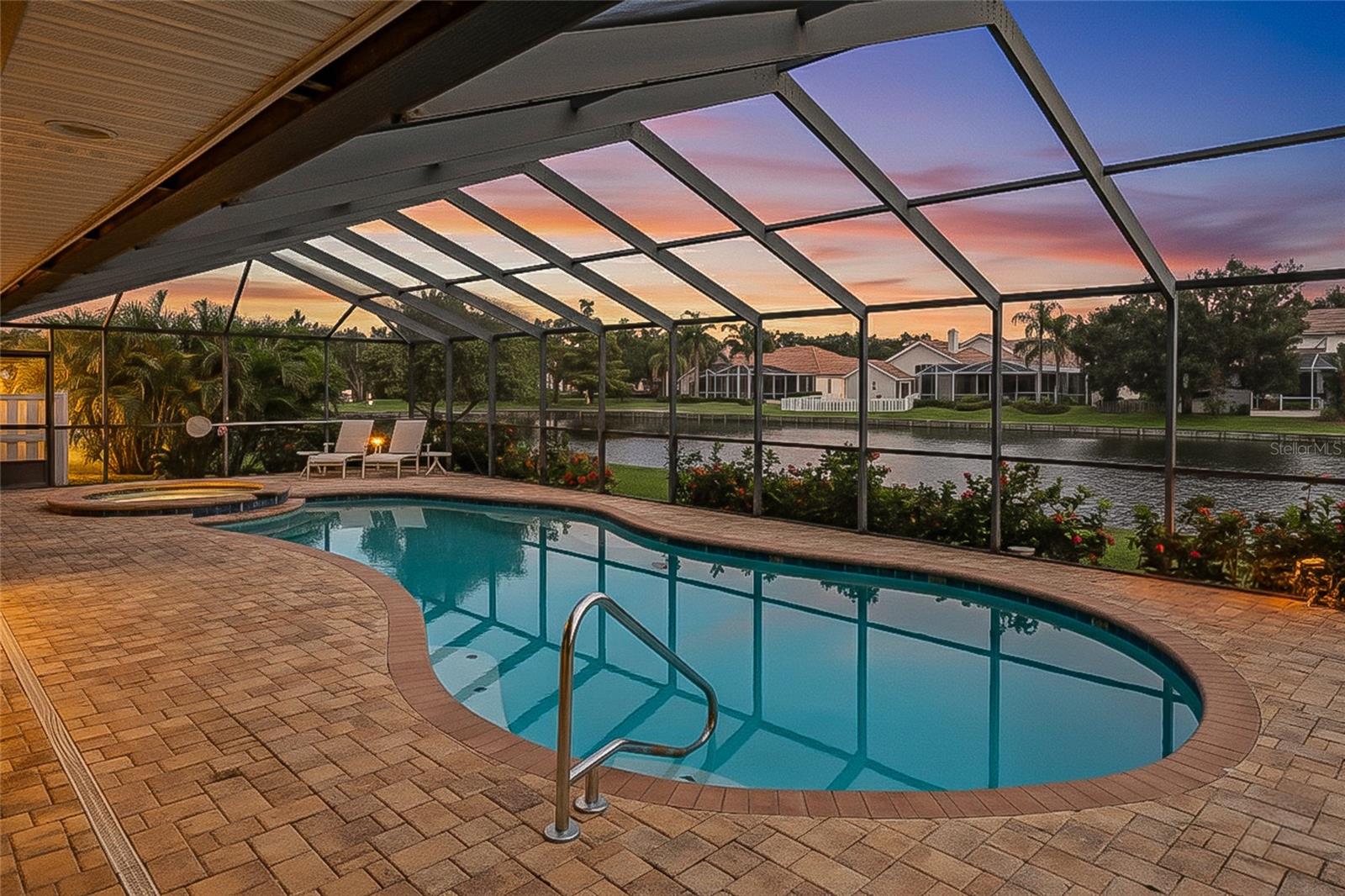 Overlooking Lake Heron, you are sure to enjoy the heated saltwater pool and spa.
