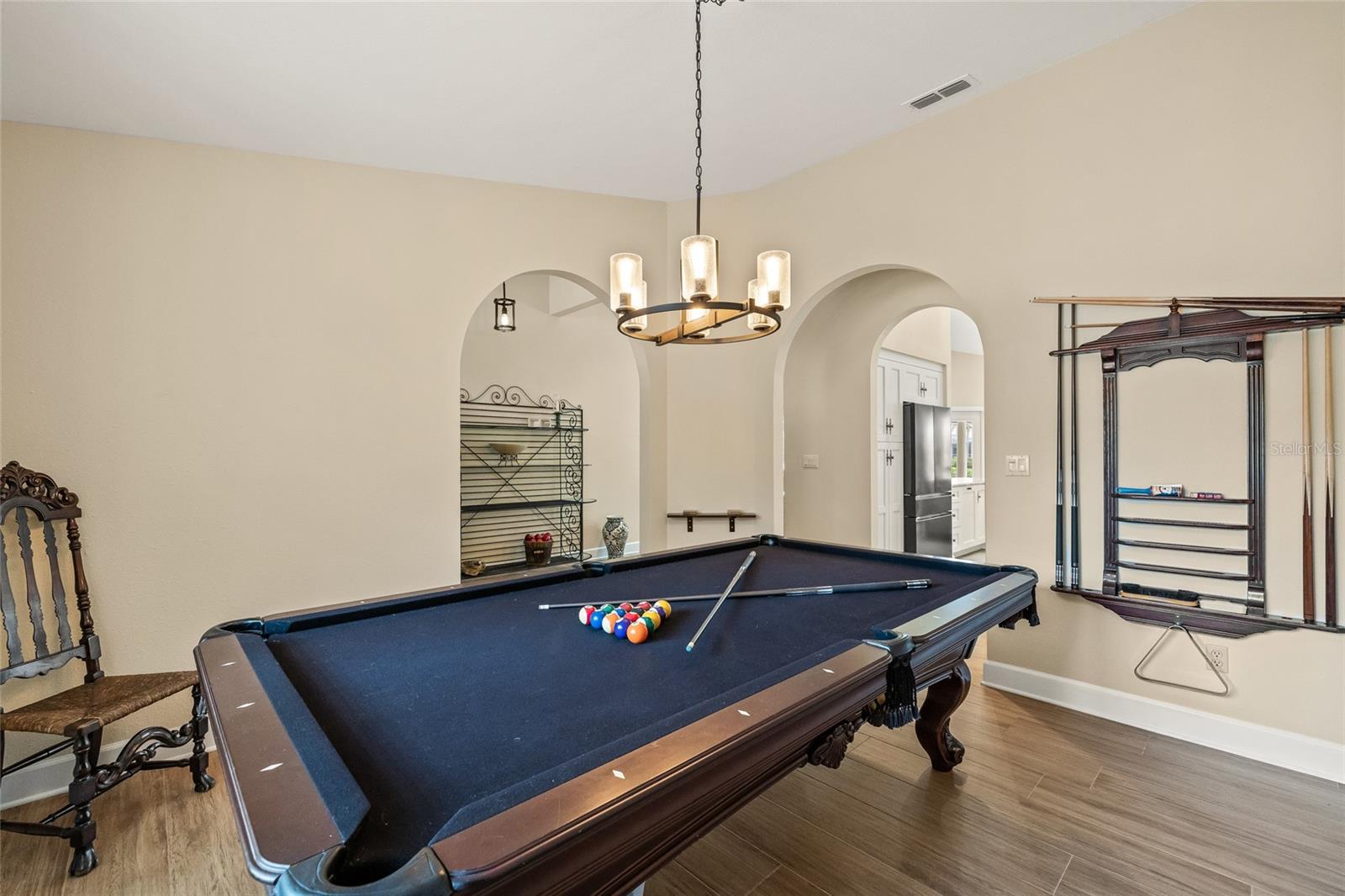 The Billiards Room adds to the custom nature of this home. The billiards table will convey with the home.