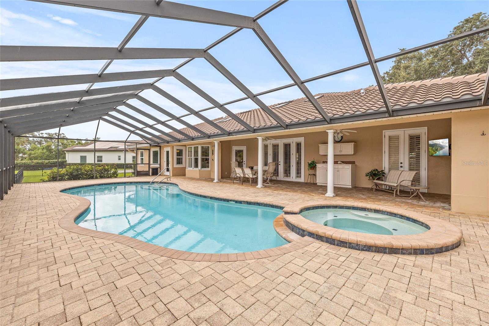 Open and airy screened lanai for pool time!