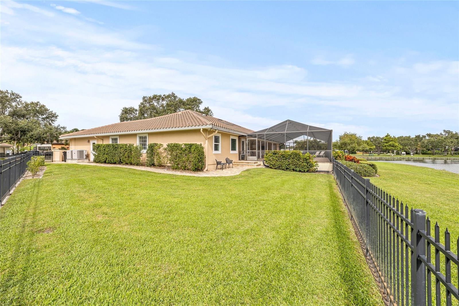 Oversized, fenced side yard offers so much flexibility.