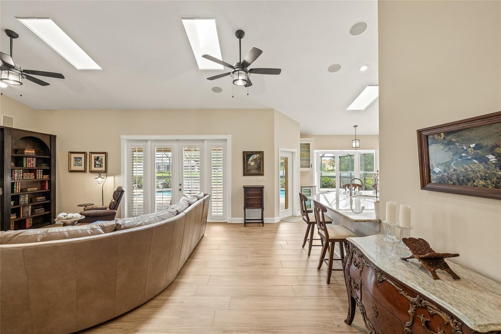 Plantation shutters grace the French doors and windows creating a classic look.