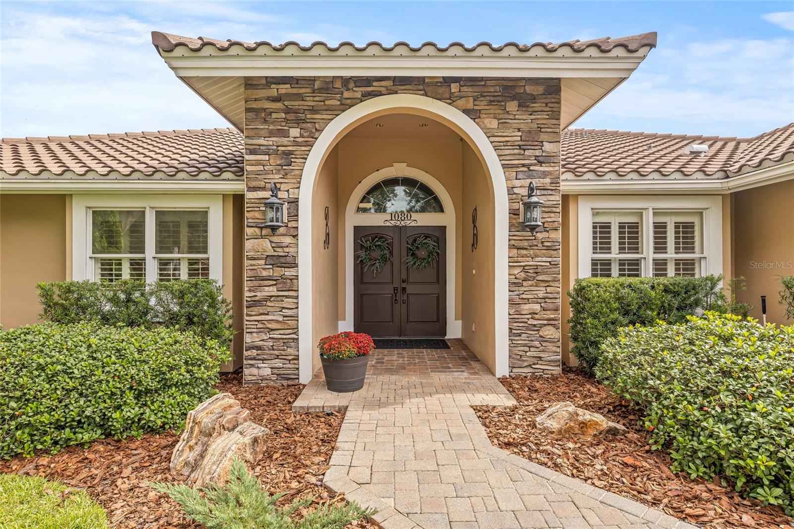 Modernized and updated front elevation provides a custom look within Placido Bayou.