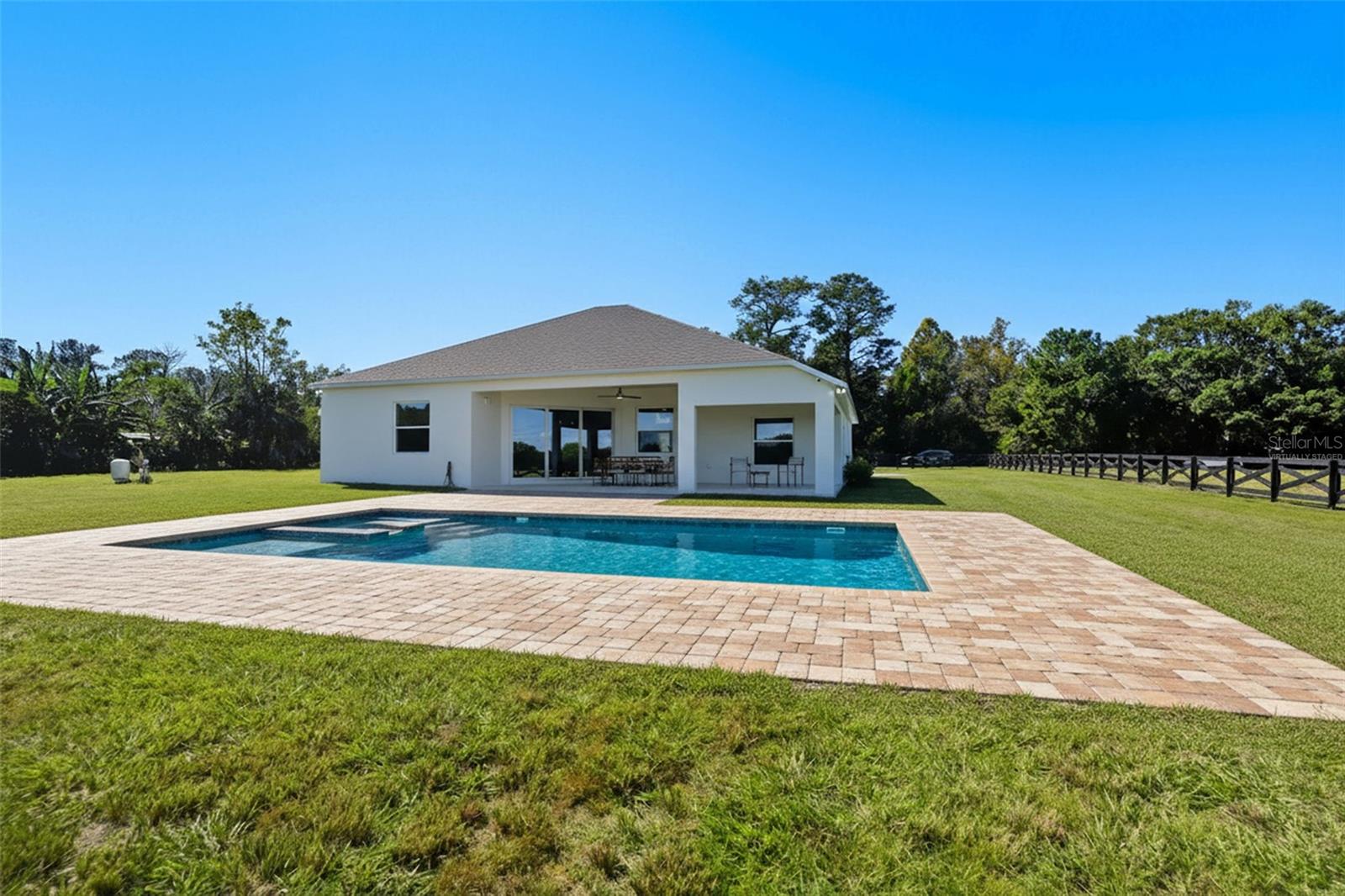 Virtually staged with pool.