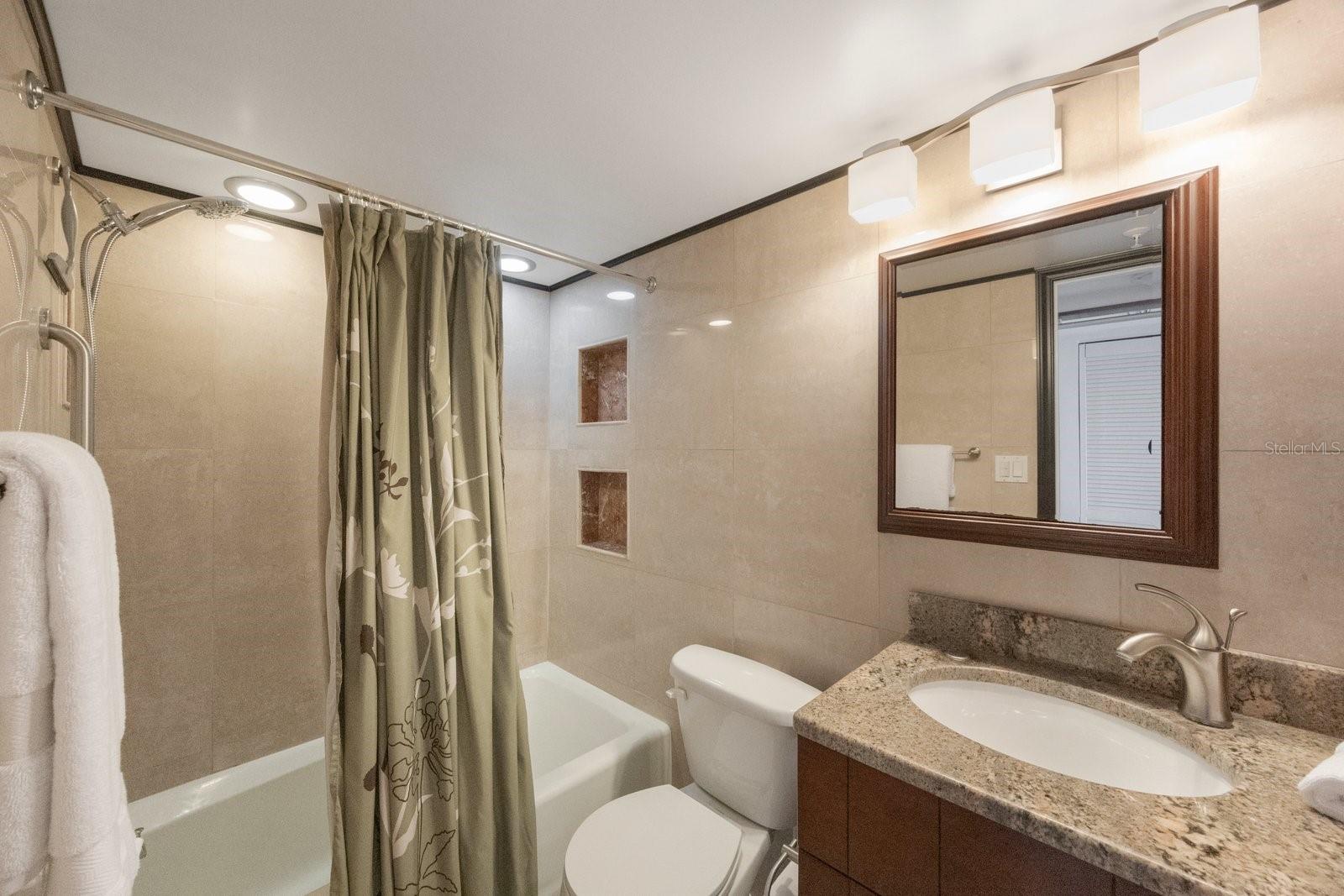 Shower with Shampoo Nooks to right