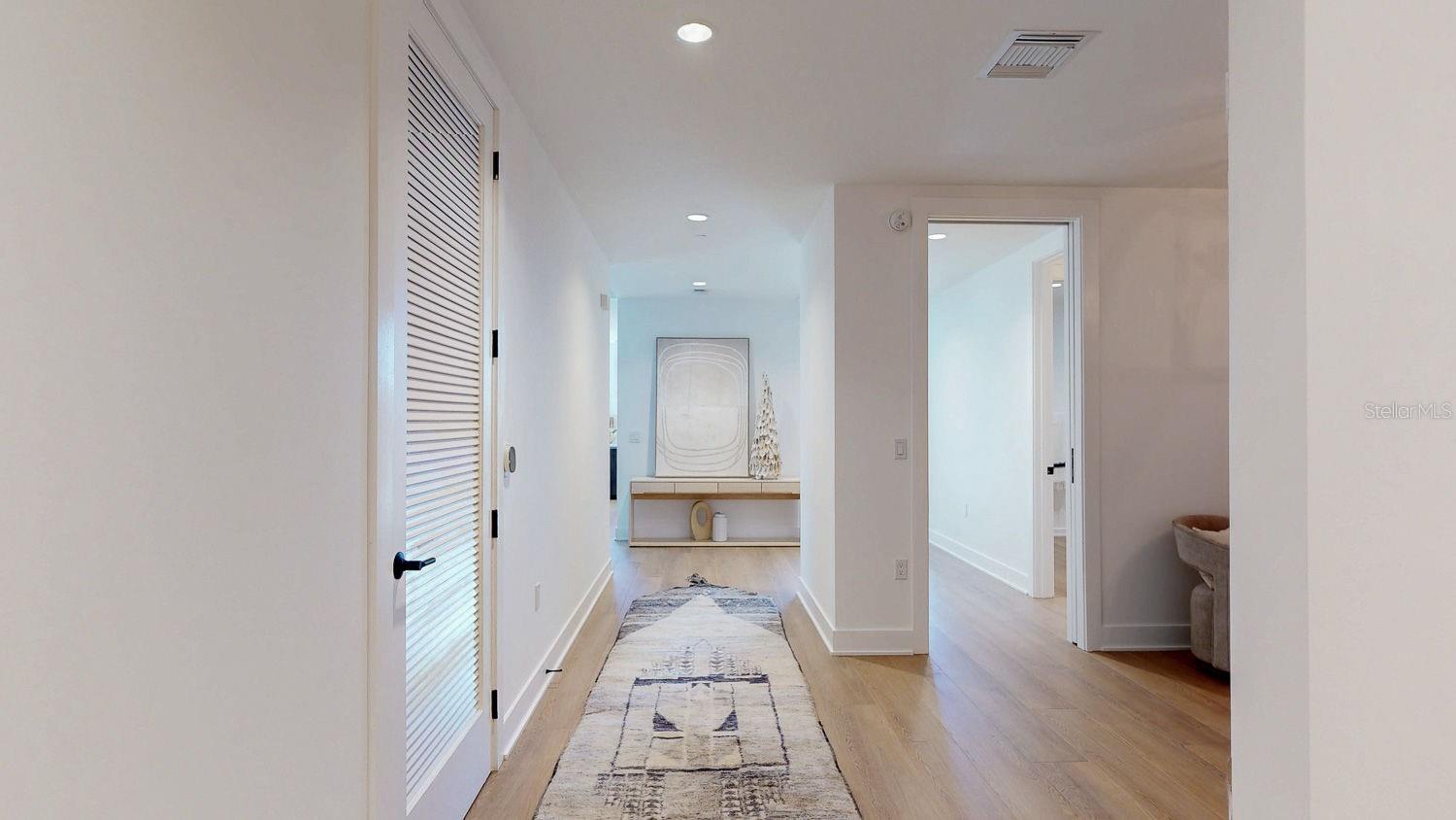 Incoming hall with right large den (wall will be put up to close), door to full bathroom and second bedroom!