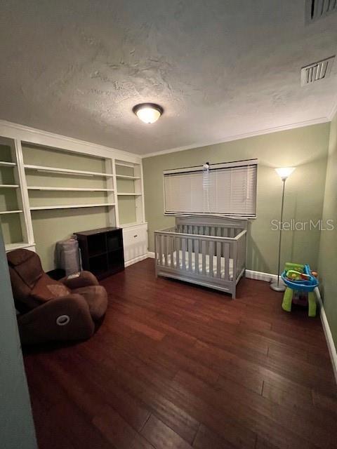 Bedroom 3 with built in dresser/shelves