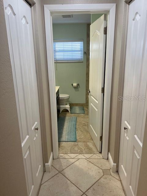Hall Bath w/ 2 closets at entry