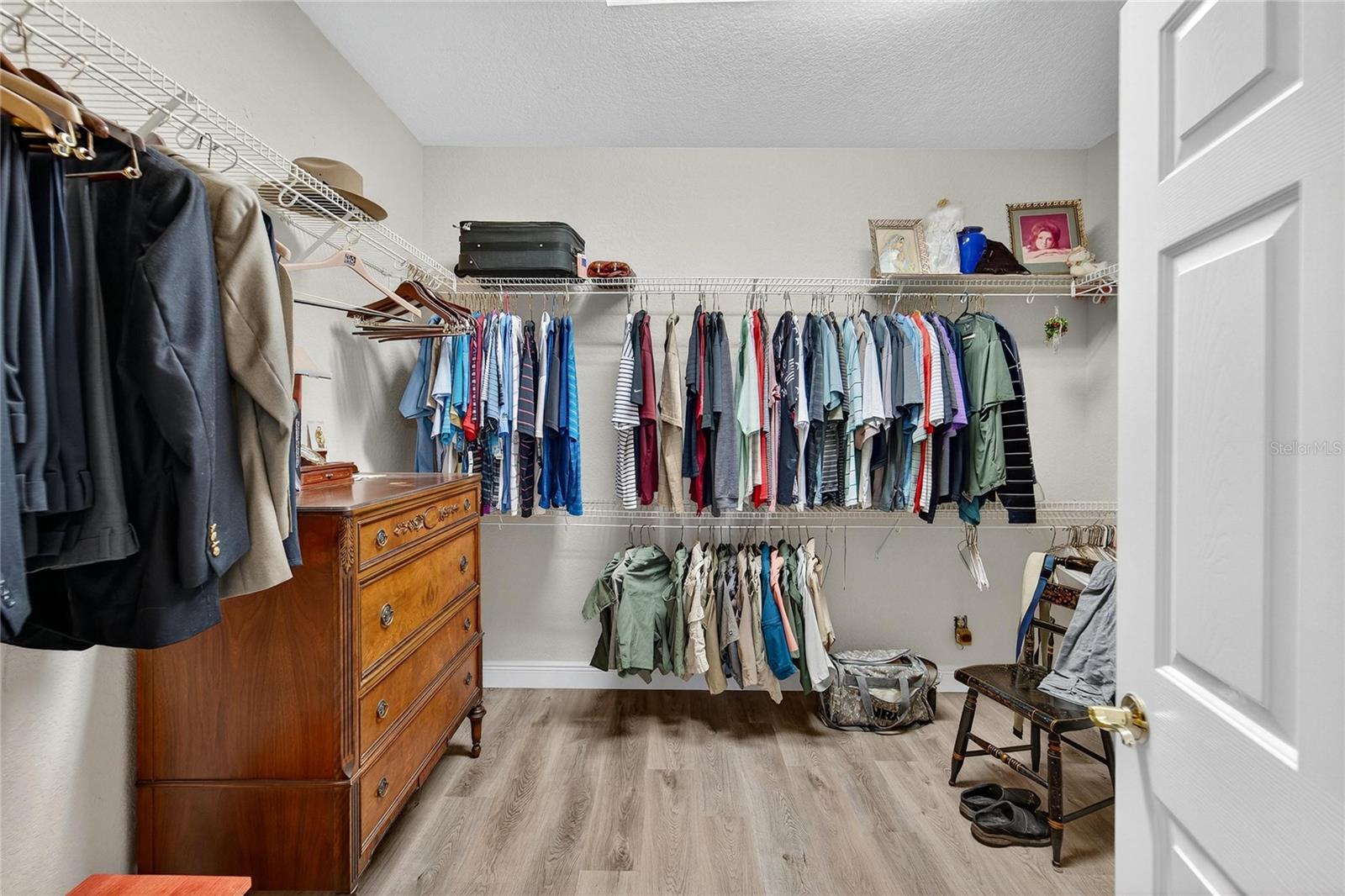 Primary Walk-in closet is massive:  12' x 9'