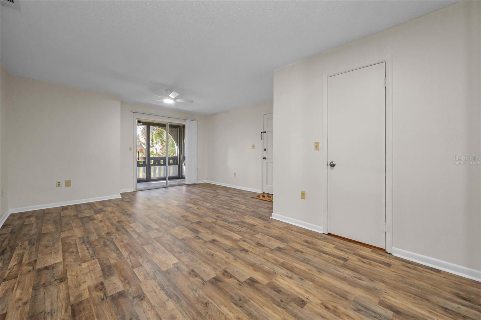 open dining and living area virtually staged