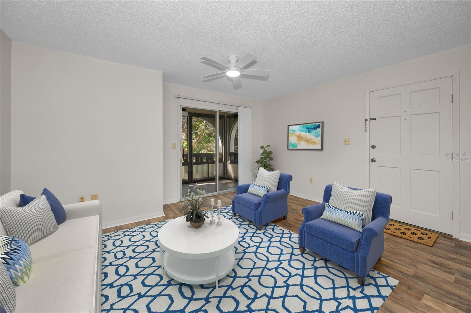 living area to patio balcony virtually staged