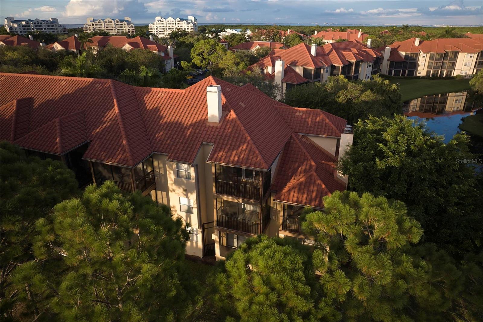 Audubon Community - Corner unit looking over pond and golf course