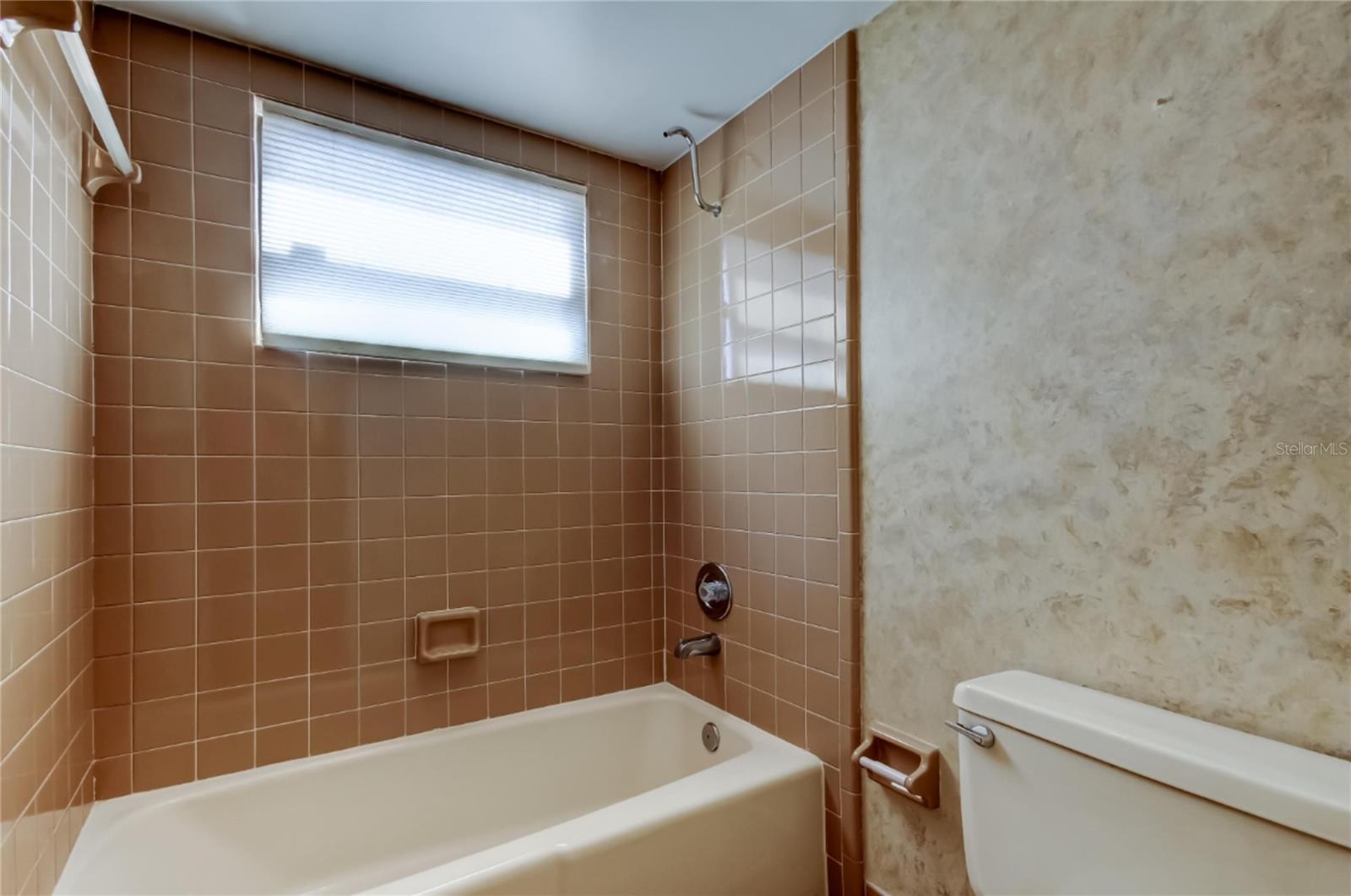 Primary BR with alcove and built in dresser/closets