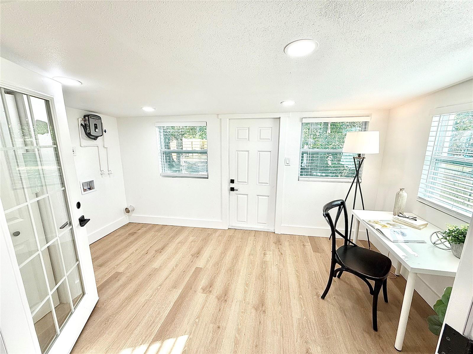Optional 3rd bedroom or office with access to to the gated backyard