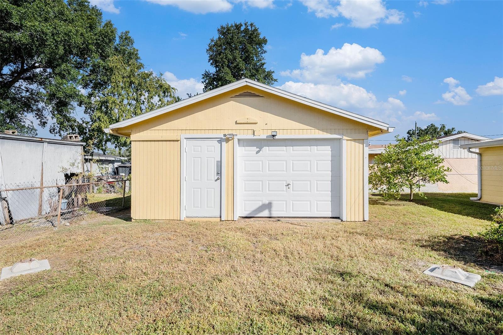 A large, private shed waiting for your personal touch! C0nvert into a studio, an outdoor bar for entertaining guests, or a private workshop.