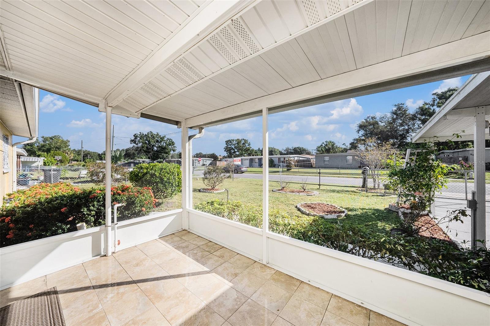 Start every morning with fresh air and sunlight on your screened front porch