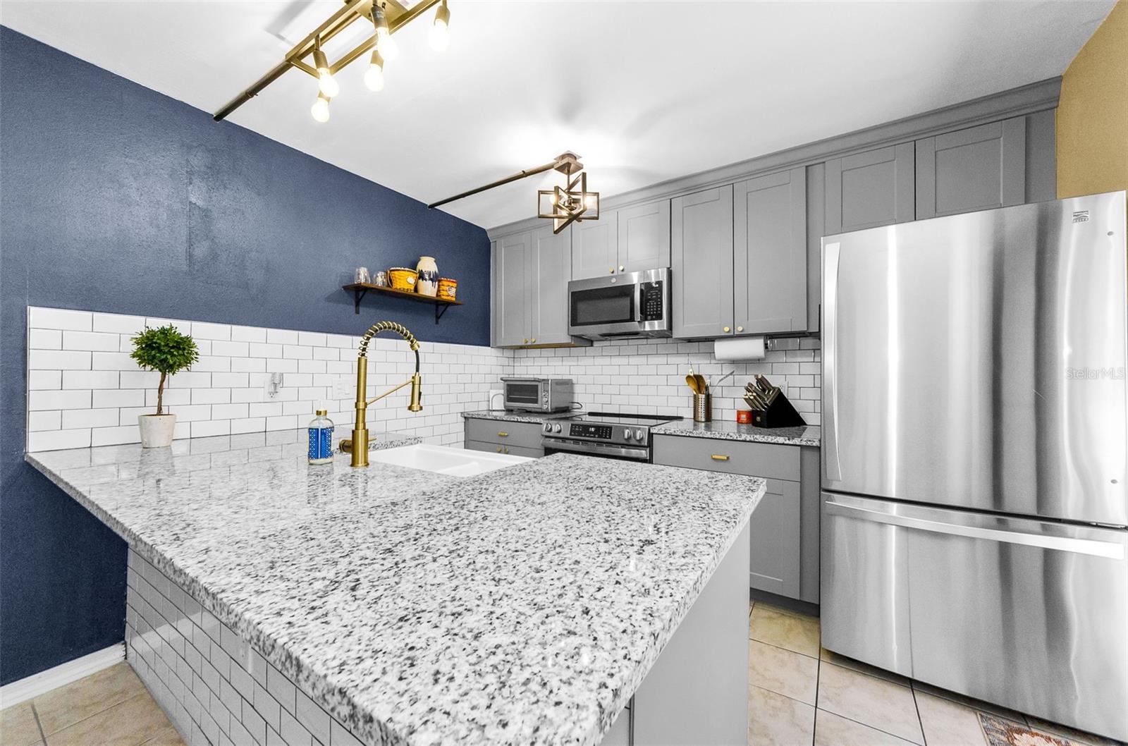 Nice size island, plenty of room for counter stools!