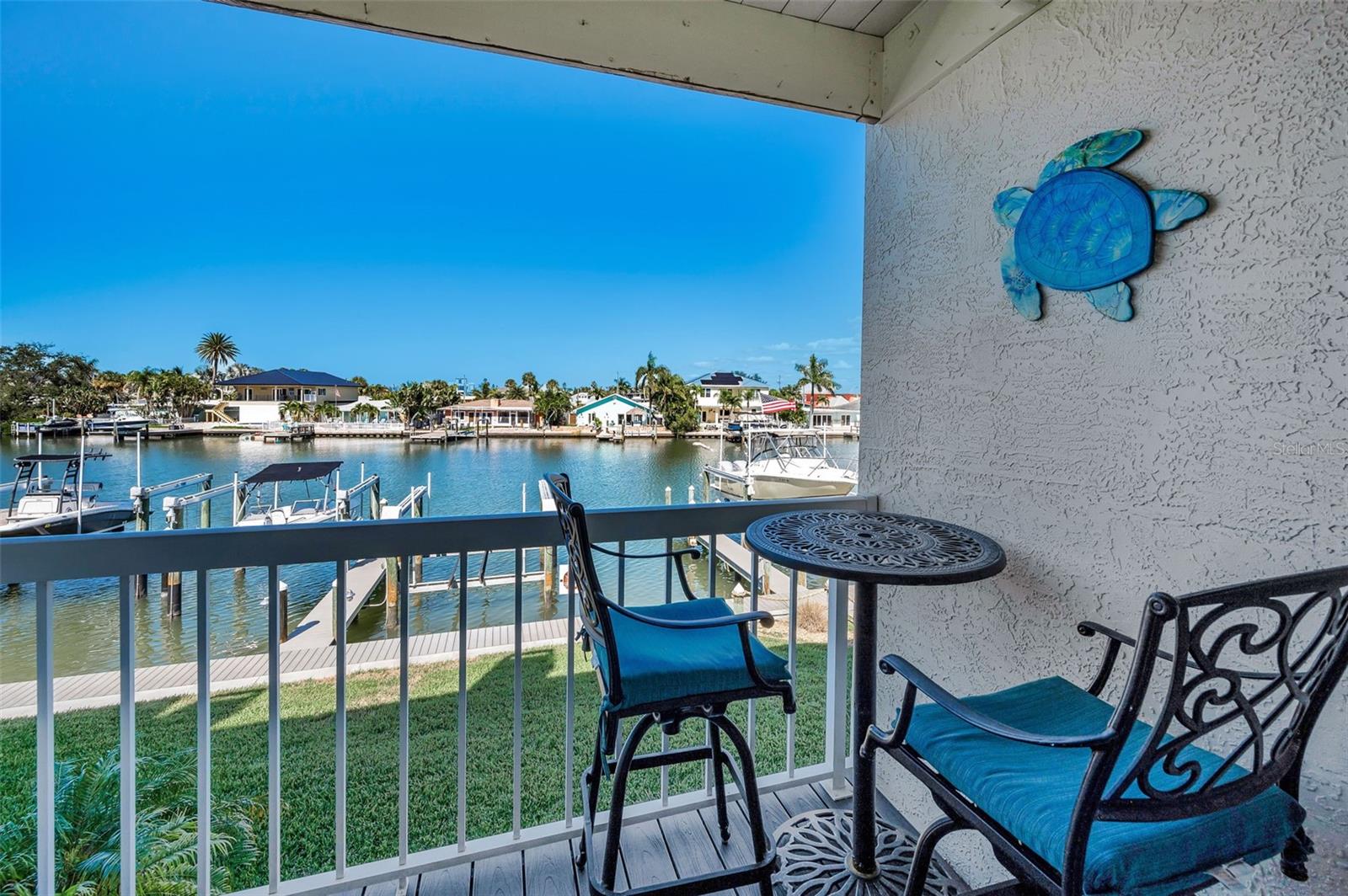 Main level balcony overlooking the Intracoastal and Community Boat Slips