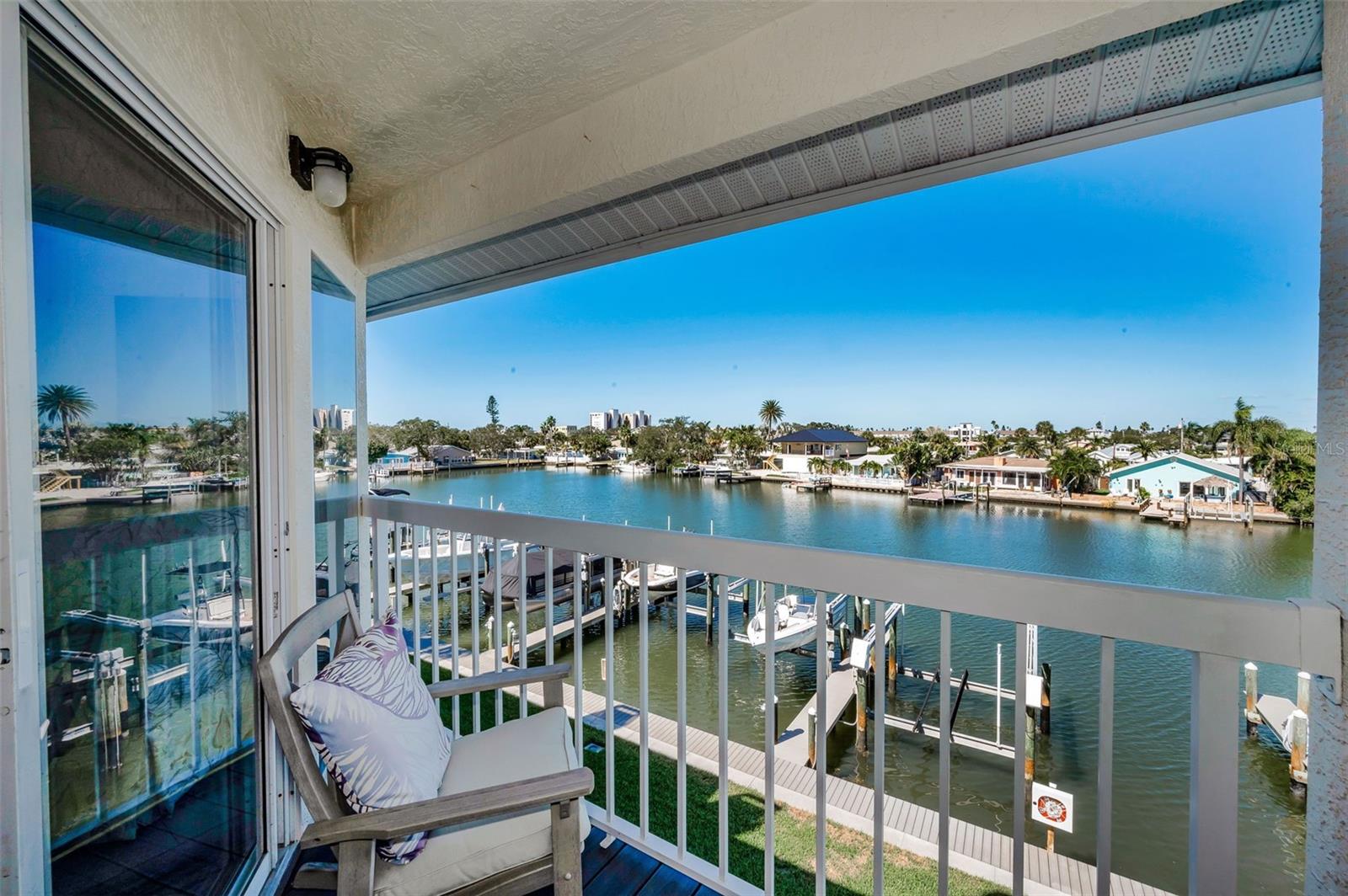 Primary Bedroom Balcony overlooking the Community Boat Slips