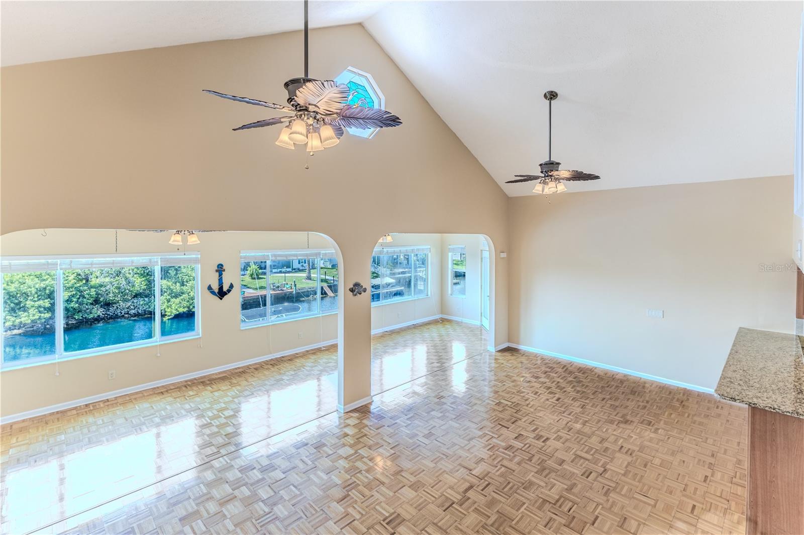 Open Floor Plan with Windows & Vaulted Ceiling